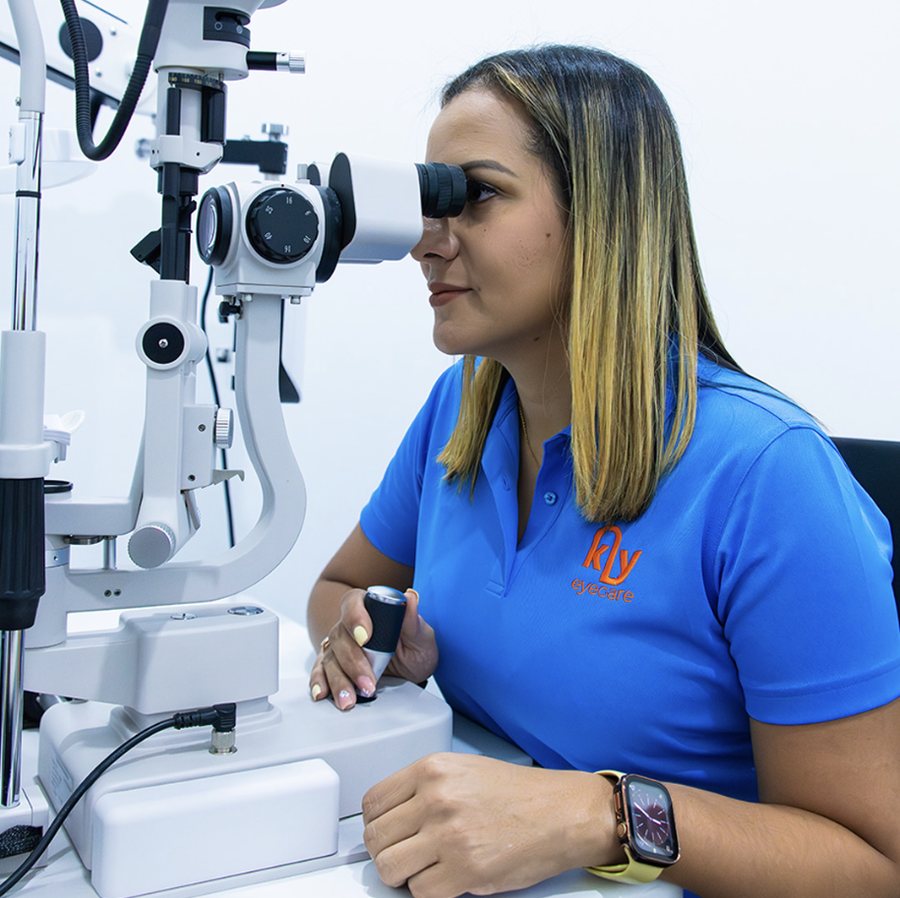 Optometrist at a slit lamp